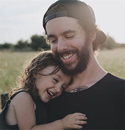 Father and daughter laughing